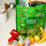 yellow banana fruit on green plastic pack