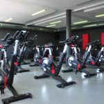 black and red stationary bikes