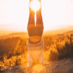 woman in white jacket elevating her feet outdoor