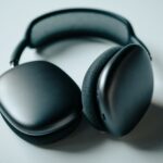 black headphones on white table